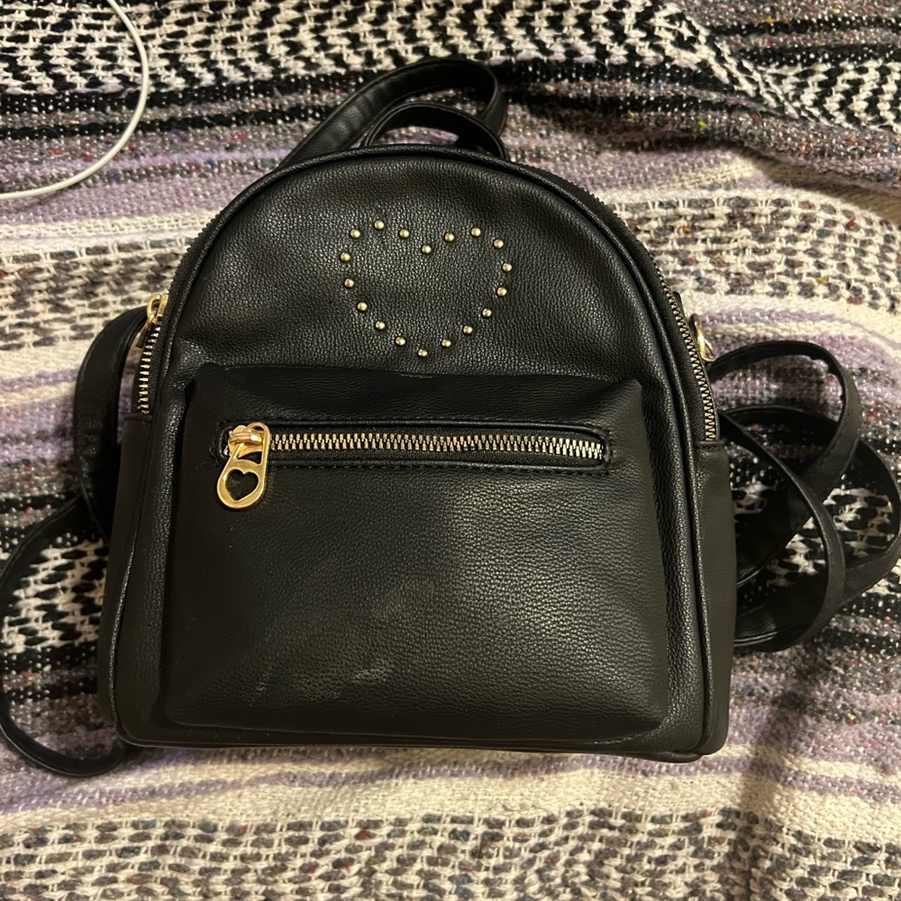 Mini black vegan leather heart backpack with gold hardware